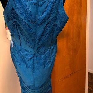 Gianni bini blue dress. Has spaghetti straps, fringes at the bottom.